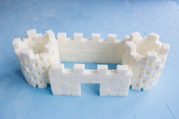Sugar castle built out of sugar cubes, sugar tower, sugar walls,