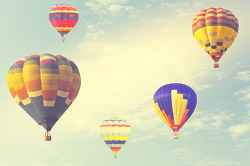 Hot air balloon on sun sky with cloud, vintage and retro instagram filter effect style