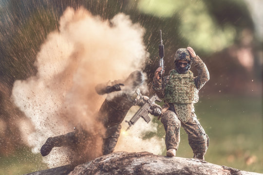 Soldier avoiding an explosion