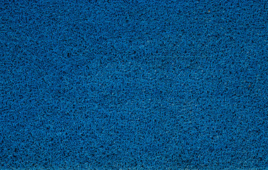 Obraz premium powitalny dywan na tle tekstury drzwi.