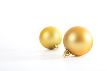Two beautiful christmas gold balls isolated on white - 127420204