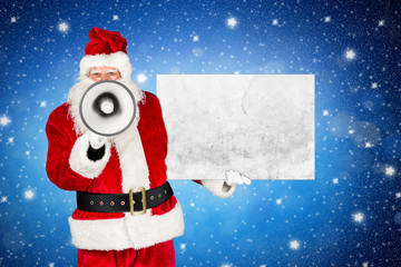 Santa claus megaphone holding empty concrete billboard and pointing with his finger in front of...