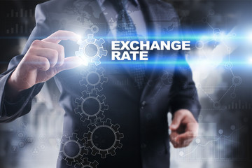 Businessman selecting exchange rate on virtual screen.