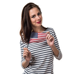 Pretty young girl holding an american flag