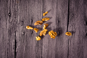 Nuts on wooden background