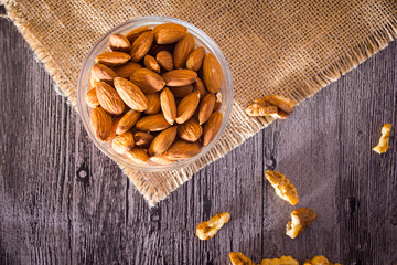 Nuts on wooden background
