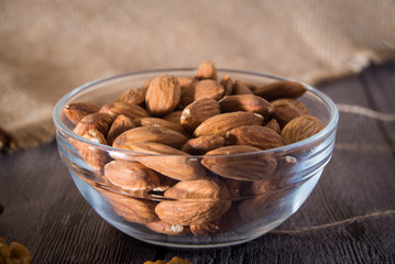 Nuts on wooden background