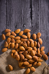 Nuts on wooden background