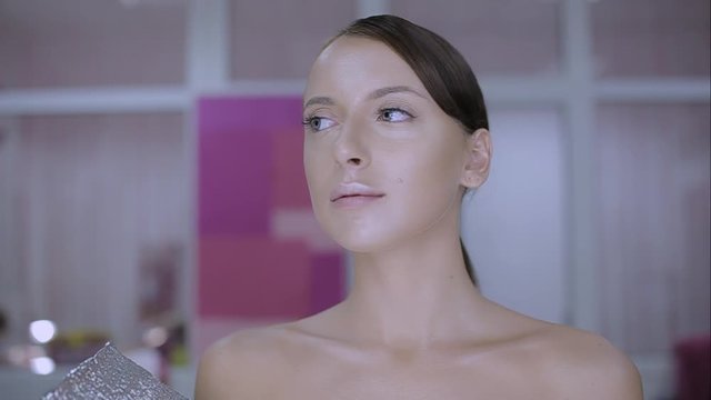 make-up artist doing make-up fashion