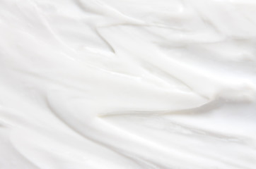 Fototapeta na wymiar Cosmetics. Cream white background texture.