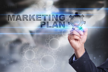 Businessman is drawing on virtual screen. marketing plan concept