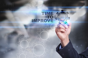 Businessman is drawing on virtual screen. time to improve concept