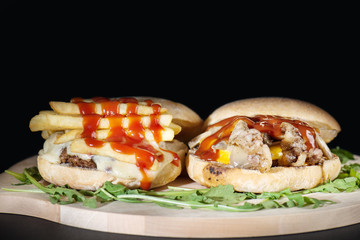 sandwich with meat, cheese and ketchup