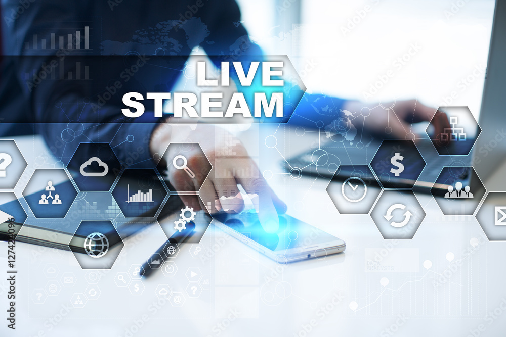 Poster businessman is working in office, pressing button on virtual screen and selecting live stream