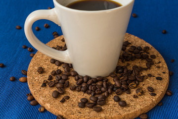Coffee. Coffee cup with coffee beans. Toned image.