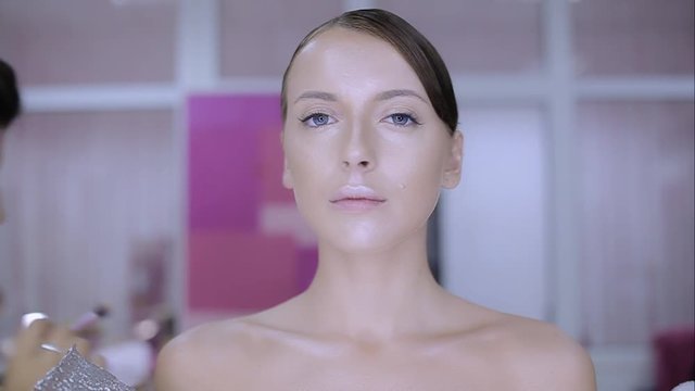 make-up artist doing make-up fashion