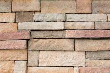 stone wall. Brown brick wall background texture.