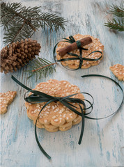 Homemade  cookies and on light old wooden table