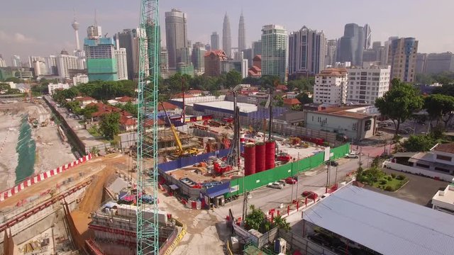 descending shot crane in FG Kuala Lumpur skyline in BG