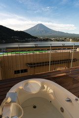 Mount Fuji view from private onsen bath tub at a hotel in Lake Kawaguchiko, Yamanashi, Japan