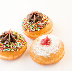 Fresh donuts with jelly and chocolate for Hanuka celebration. 