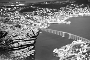 High altitude Tromso mountain cliff background