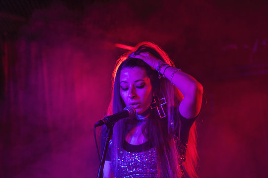 Young woman performing at a club