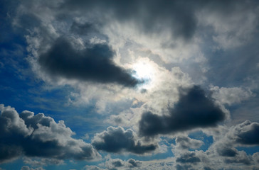 Naklejka na ściany i meble Dramatic blue sky with gray clouds