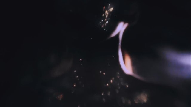 The girl's face is covered with gloss and glitter . Posing