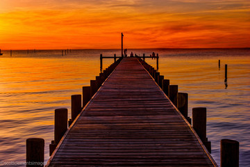 Naklejka premium Sunset Fishing