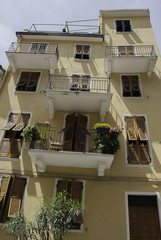 Building with balcony in Italy