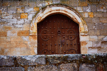 Fototapeta na wymiar Zamora detail of old aged wood door in Spain