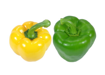 Closed up two ripe vibrant color bell peppers, one yellow and one green with stem, isolated on white background