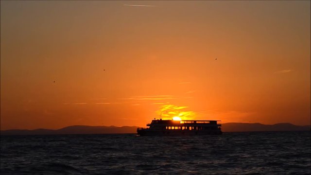 Boat on the sea at sunset in Izmir - Turkey