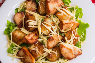 Caesar salad with chicken and croutons