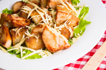 Caesar salad with chicken and croutons
