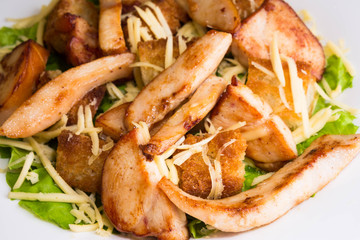 Caesar salad with chicken and croutons