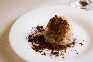 Panna cotta topped with grated chocolate
