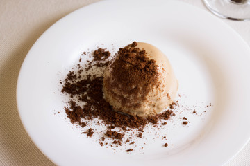 Panna cotta topped with grated chocolate