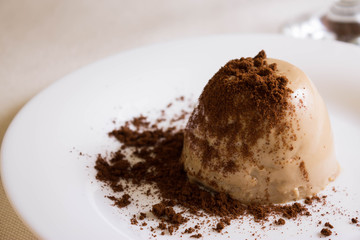 Panna cotta topped with grated chocolate