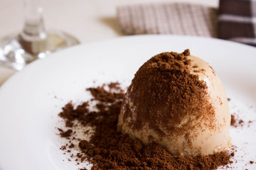 Panna cotta topped with grated chocolate