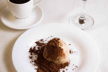Panna cotta topped with grated chocolate