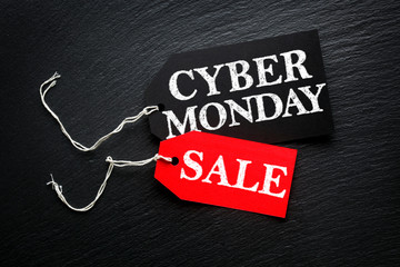 Cyber Monday Sale tags on dark background