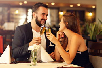 Romantic couple dating in restaurant