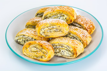 Sweet yeast rolls with cheese and poppy seeds