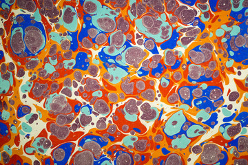 Ebru art. Traditional Turkish Ebru technique. Painting on water, followed by paper prints. Color...