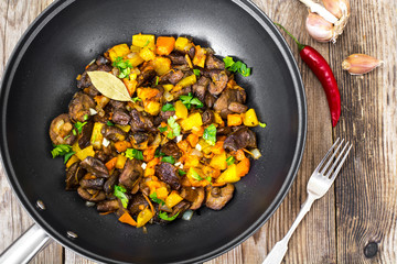 Vegetable stew with pumpkin, celery and mushrooms