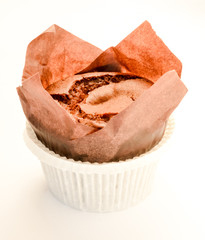 Delicious chocolate muffin on white background witch copy space