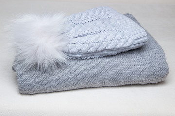 Knitted cap and jacket for winter walks.