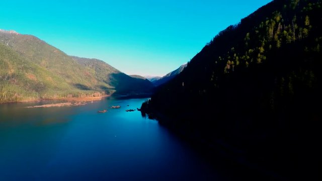 A 360 degree view of the sun rising on Lake Cushman and the Olympic Mountain System
